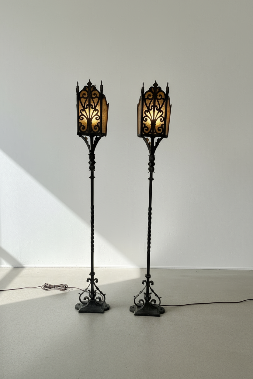 Pair of vintage wrought iron floor lamps with amber mica lantern shades, featuring scrollwork and twisted details in Mission or Arts & Crafts style — Hommes and Gardens, Lights + Lanterns Collection, Home Decor, Landscape Architect, Interior Designer, Outdoor Living, Outdoor Decorations, Home Design, Luxury Design, Art, Furniture, Objects, Best Gifts, Nature, Backyard, Yard.