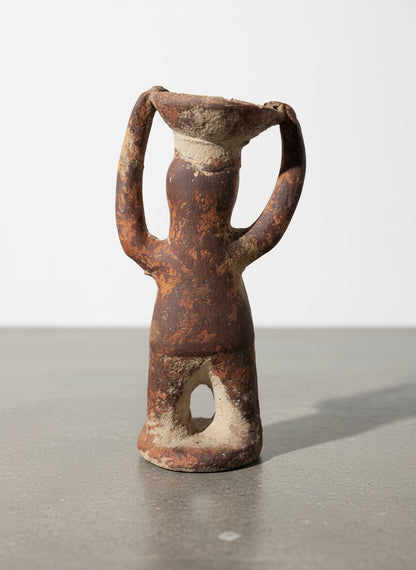 Back view of Pre-Columbian terracotta ritual figure showing hollowed base, raised arms, and weathered brown patina highlighting its handmade primitive character — Hommes and Gardens, Home Decor, landscape design, plant design, Landscape Architect, Interior Designer, Outdoor Living, Outdoor Decorations, Home Design, Luxury Design, Art, Furniture, Objects, Best Gifts, Nature, Backyard, Yard.