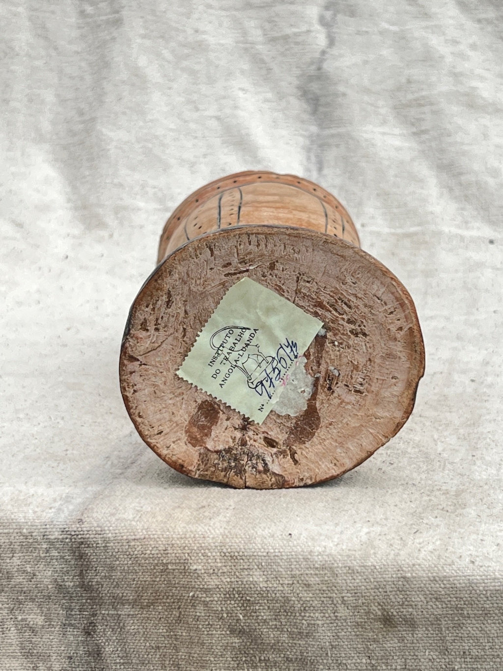 Base view of a Pair of Vintage Wooden Goblets with Hand Carved Primitive Illustrations showing the unique wood texture and engraving. hommes + gardens estudio.