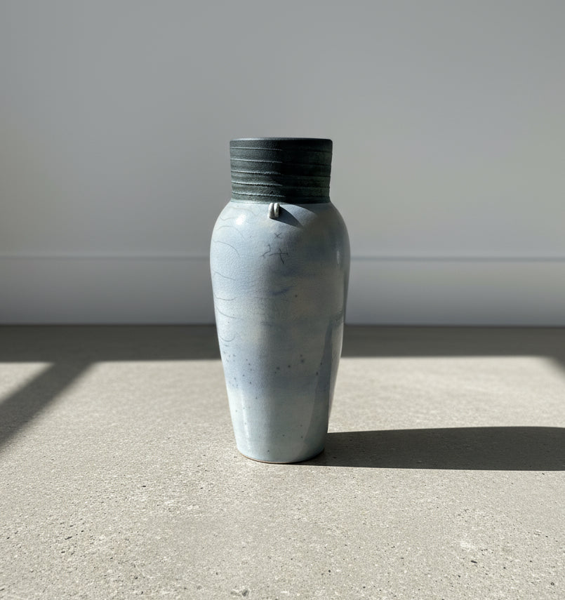 Raku elegant handcrafted ceramic vase with crackled glaze, ribbed darkened rim, and loop handles, featuring a drainage hole and artist’s signature, a refined Japanese-inspired pottery collectible — Hommes and Gardens, Pots + Vessels Collection, Home Decor, Landscape Architect, Interior Designer, Outdoor Living, Outdoor Decorations, Home Design, Luxury Design, Art, Furniture, Objects, Best Gifts, Nature, Backyard, Yard.