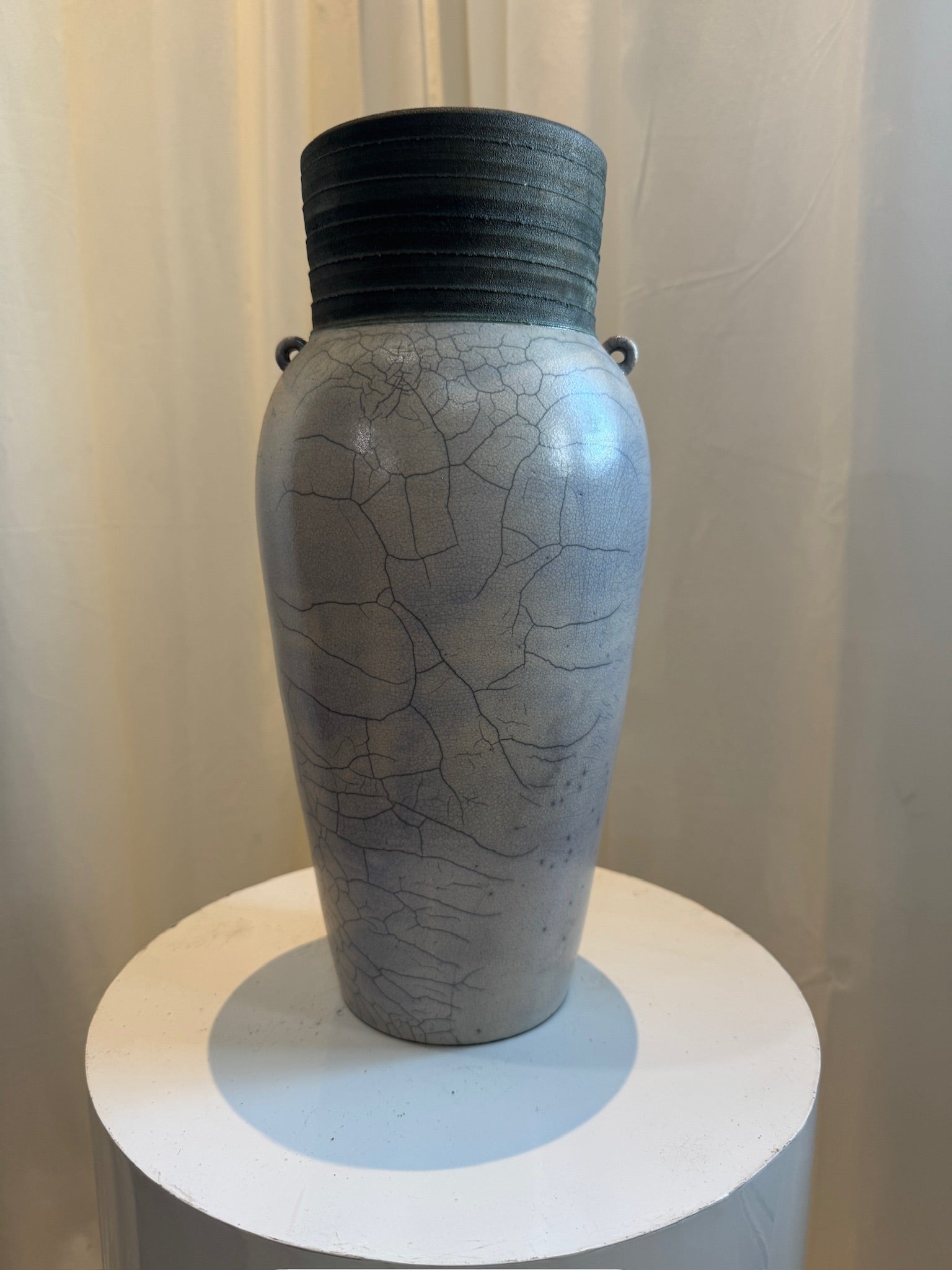 Raku elegant handcrafted ceramic vase featuring crackled glaze, ribbed dark rim, and drainage hole, Japanese-inspired pottery with organic beauty — Hommes and Gardens, Vases + Vessels Collection, Landscape Architect, Interior Designer, Outdoor Living, Art, Furniture, Objects, Best Gifts, Nature, Backyard, Yard, Outdoor Decorations, Home Decor, Home Design, Luxury Design.