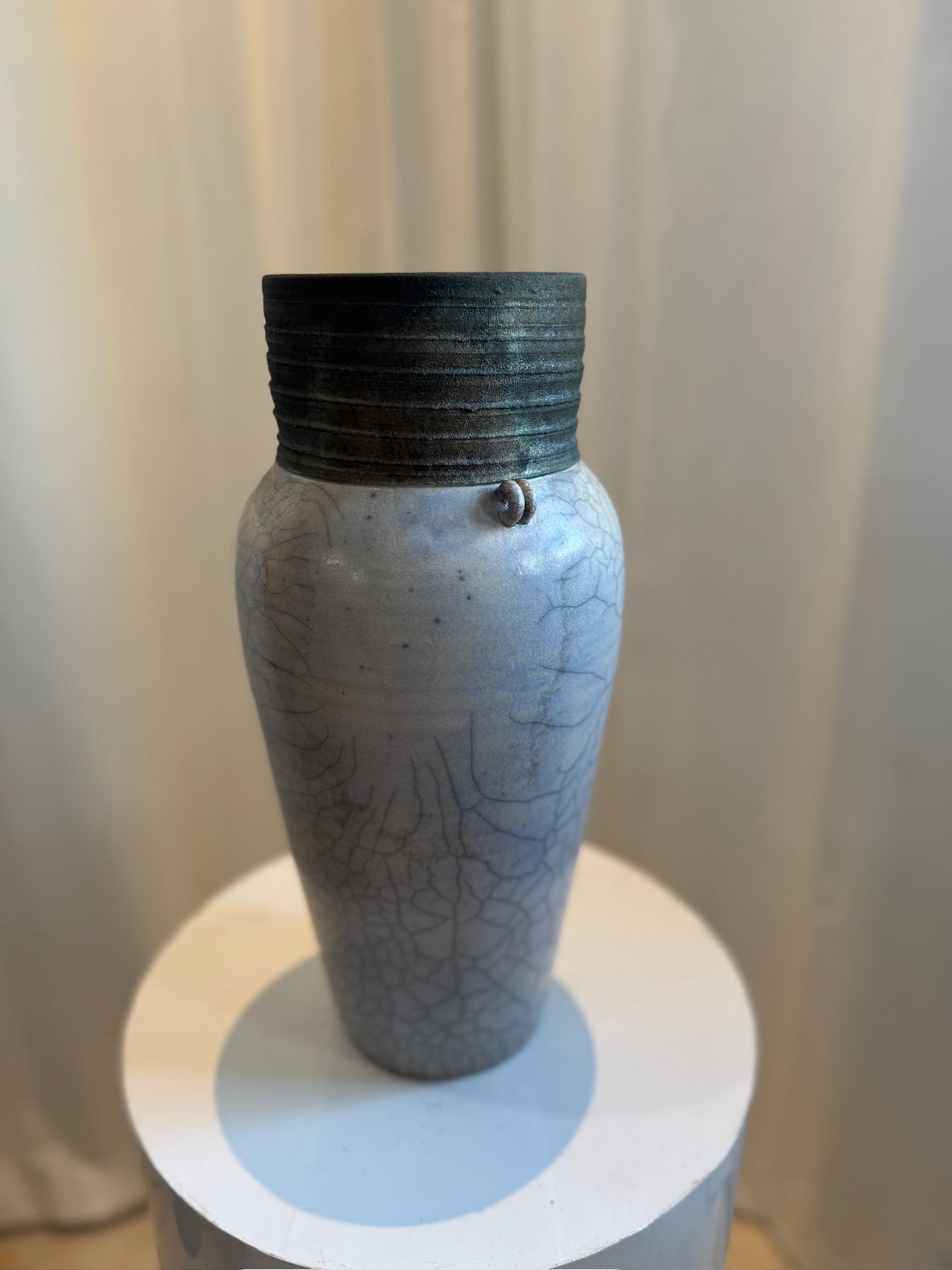Raku handcrafted pottery vase with Japanese crackle glaze and small loop handles, featuring aged finish and organic wabi-sabi beauty — Hommes and Gardens, Vases + Vessels Collection, Landscape Architect, Interior Designer, Outdoor Living, Art, Furniture, Objects, Best Gifts, Nature, Backyard, Yard, Outdoor Decorations, Home Decor, Home Design, Luxury Design.