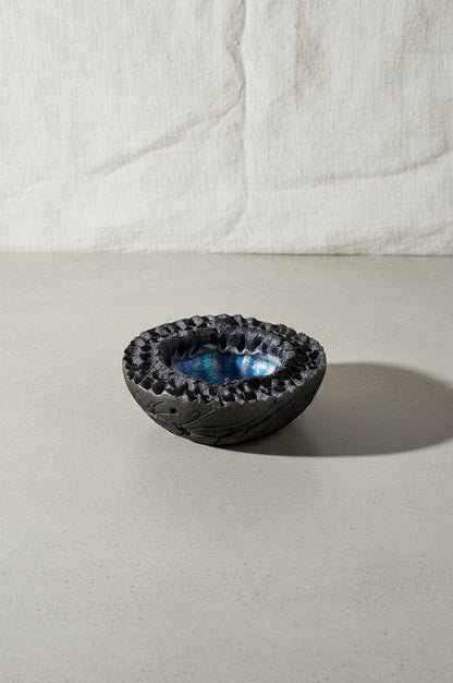 Raku Lava Bowl by Hutch Ceramics Maui, a 1960s vintage volcanic crater-inspired pottery piece featuring blue and black glaze with lava texture — Hommes and Gardens, Pots and Vessels Collection, Home Decor, Decorative Bowls, Art Pottery, Mid Century Modern, Raku Technique, Handmade Ceramic Art, Vintage Hawaii Pottery, Collectible Artisan Design.