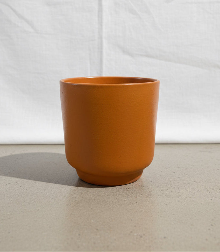 Rare mid-century terracotta planter by Architectural Ceramics of Oakland, CA, featuring minimalist cylindrical form and warm earthy tones — Hommes and Gardens, Pots + Vessels Collection, Landscape Architect, Interior Designer, Outdoor Living, Outdoor Decorations, Home Decor, Home Design, Luxury Design, Art, Furniture, Objects, Best Gifts, Nature, Backyard, Yard.