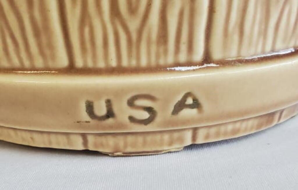 Close-up of Vintage McCoy bucket cookie jar base showing USA marking, highlighting classic craftsmanship. hommes + gardens estudio.