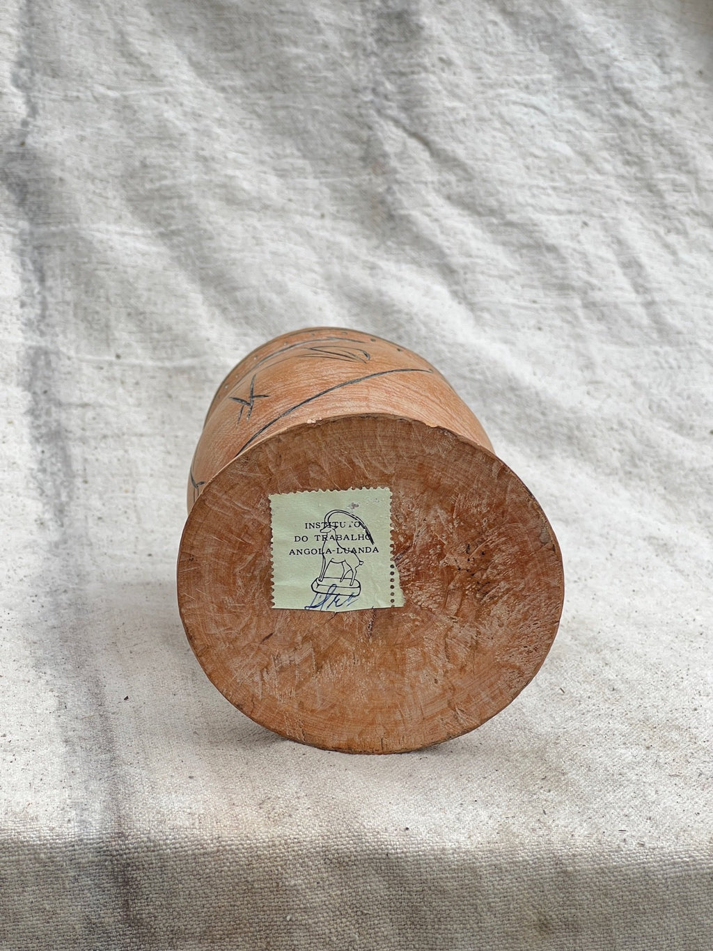 Bottom view of a Pair of Vintage Wooden Goblets with Hand Carved Primitive Illustrations, showcasing unique engraving details. hommes + gardens estudio.