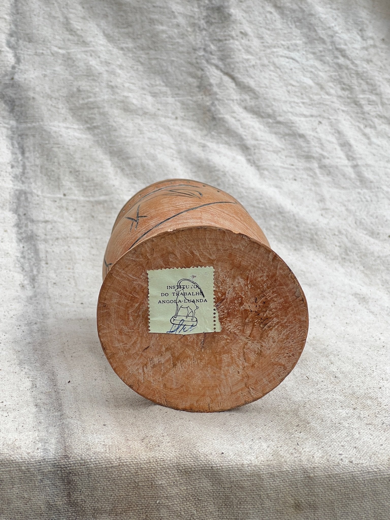 Bottom view of a Pair of Vintage Wooden Goblets with Hand Carved Primitive Illustrations, showcasing unique engraving details. hommes + gardens estudio.