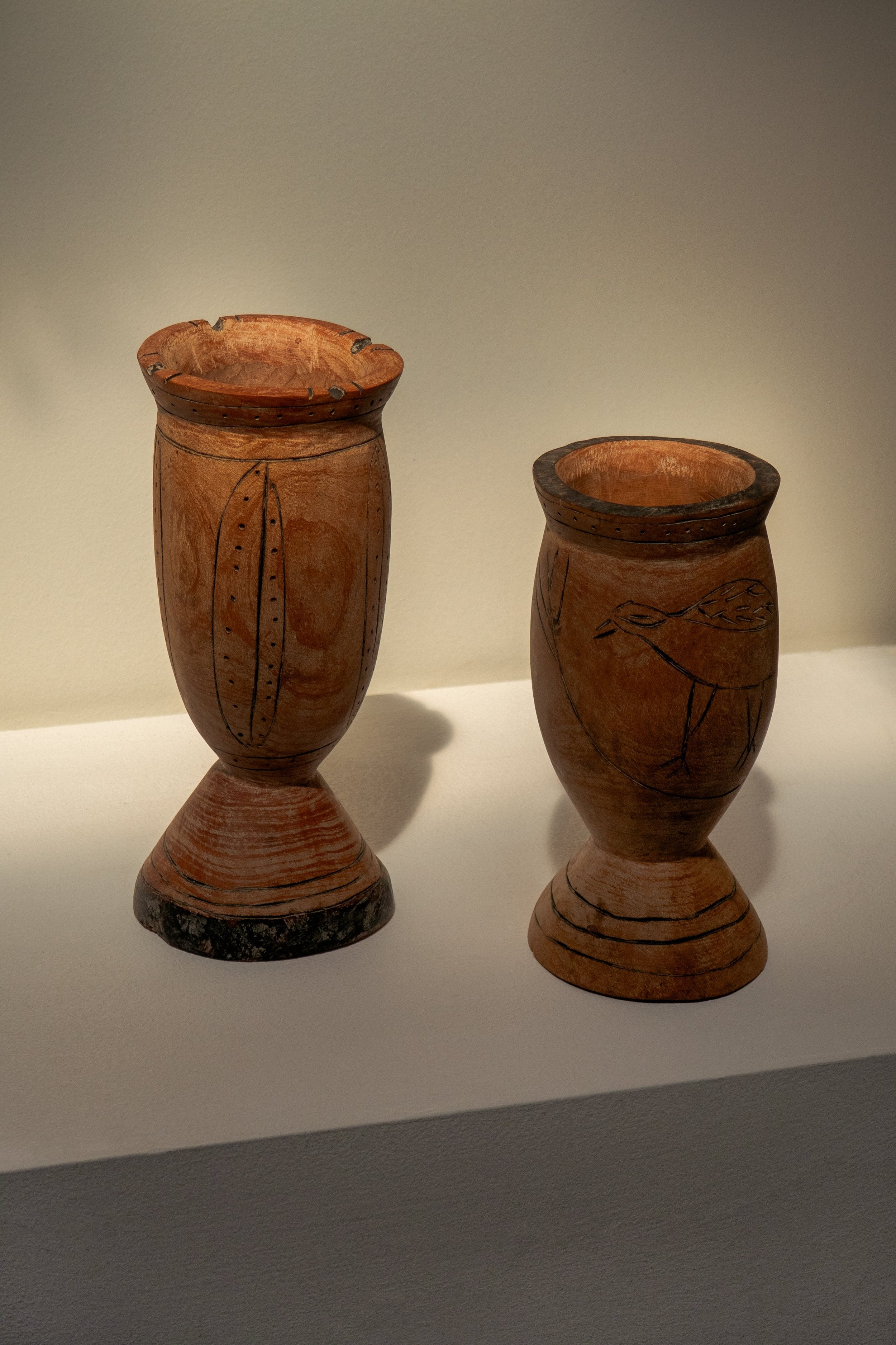 Pair of Vintage Wooden Goblets with Hand Carved Primitive Illustrations. Unique hand-carved design, vintage charm. hommes + gardens estudio.