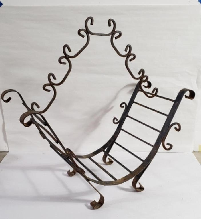 VINTAGE WROUGHT IRON FIREWOOD HOLDER showcasing rustic design and durability for your home decor. hommes + gardens estudio.