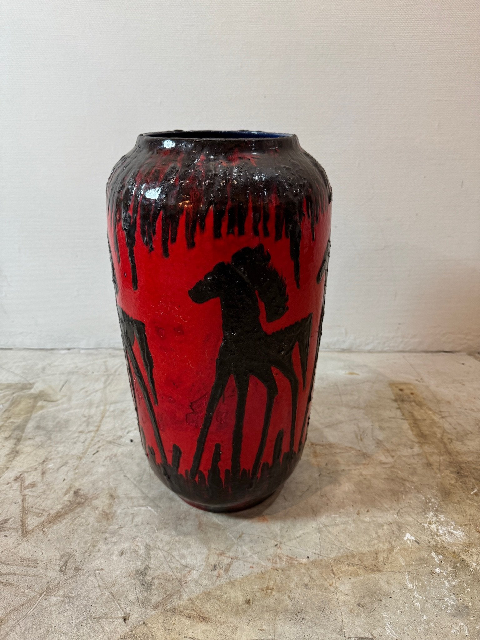 West German Red Fat Lava Horses Vase by Scheurich, 1960s with bold red and black horse motifs, showcasing unique craftsmanship. hommes + gardens estudio.