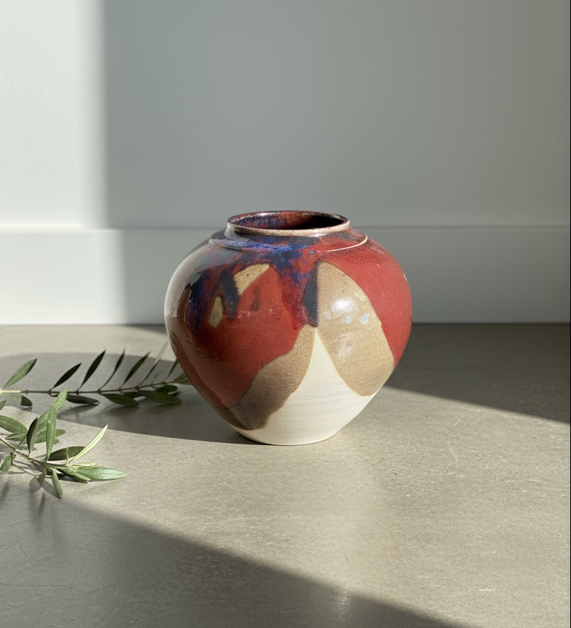 Signed glazed stoneware vase featuring unique abstract painting and bold colors, perfect for floral displays or as art. hommes + gardens estudio.