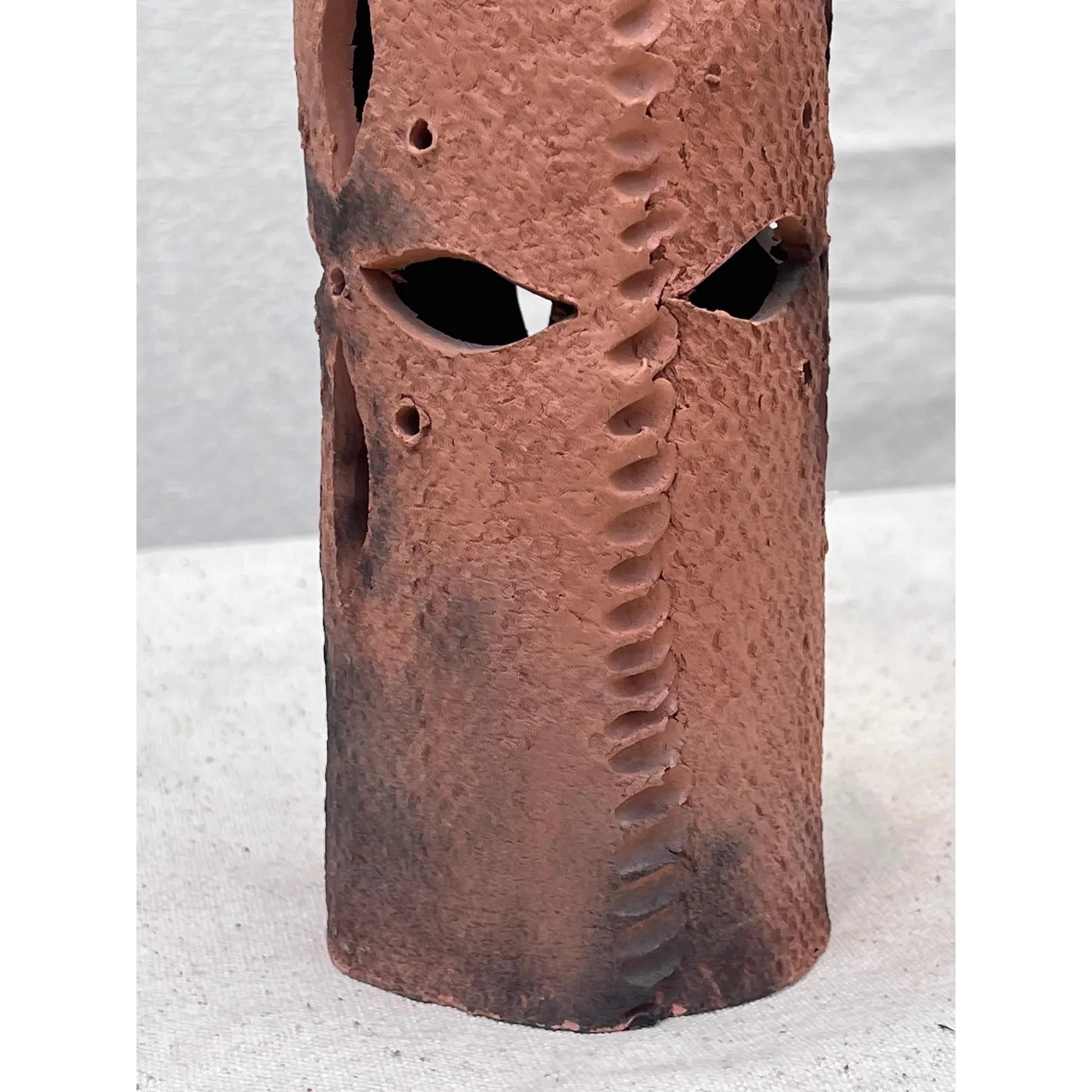 Native American Singing Indian Incense Smoker And/Or Tealight showcasing intricate petal-shaped holes and terracotta craftsmanship. hommes + gardens estudio.