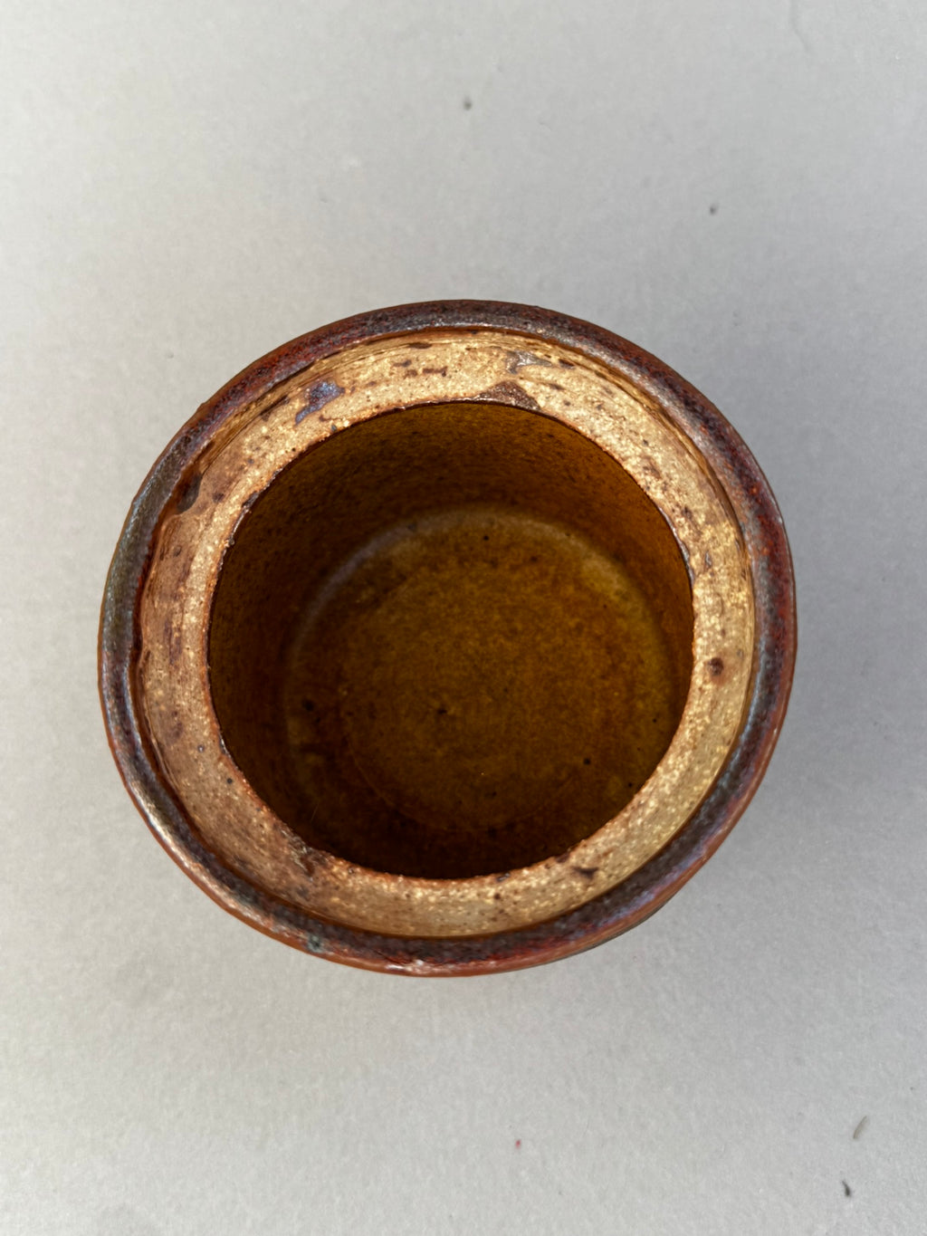 Handmade Mid-Century Modern Studio Pottery Vessel with Textured Abstract Glaze interior view, highlighting rich glaze detail. hommes + gardens estudio.
