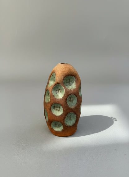 Handmade terracotta bud vase with celadon glazed circular impressions and organic textured form, modern studio pottery design — Hommes and Gardens, Home Decor Collection, landscape design, plant design, Landscape Architect, Interior Designer, Outdoor Living, Outdoor Decorations, Home Design, Luxury Design, Art, Furniture, Objects, Best Gifts, Nature, Backyard, Yard.