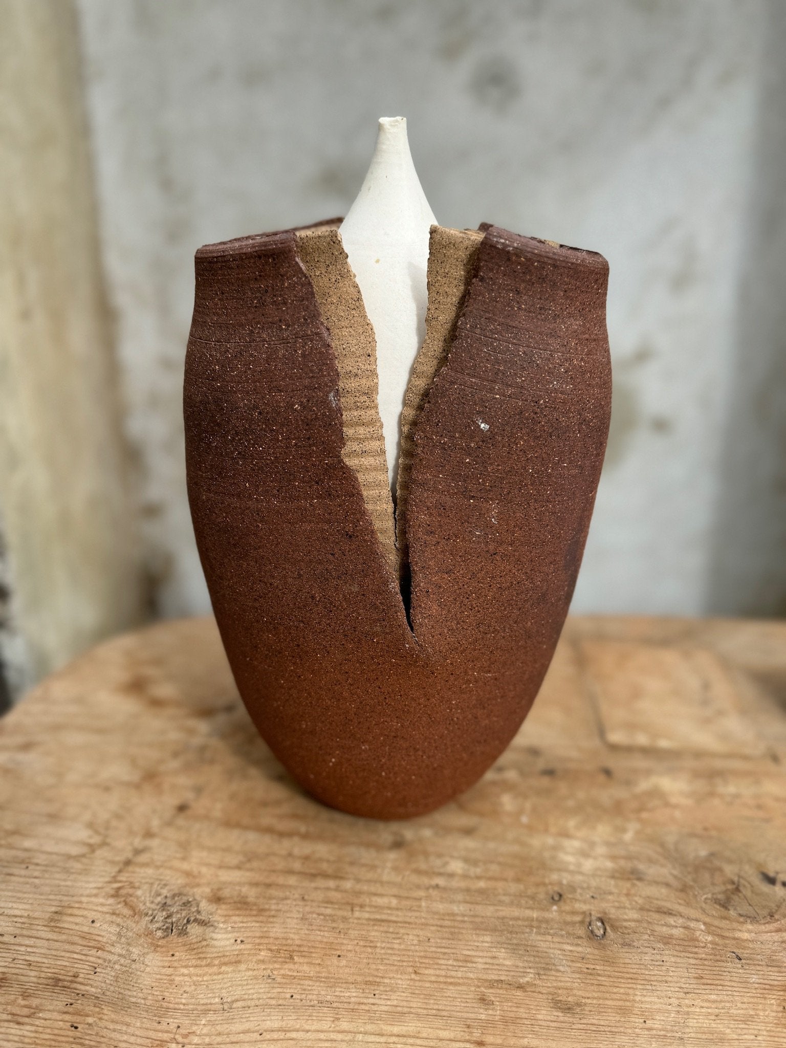 Transformation Pottery Art Sculpture showcasing unique ceramic design with earthy tones, signed by Barker 1985. hommes + gardens estudio.