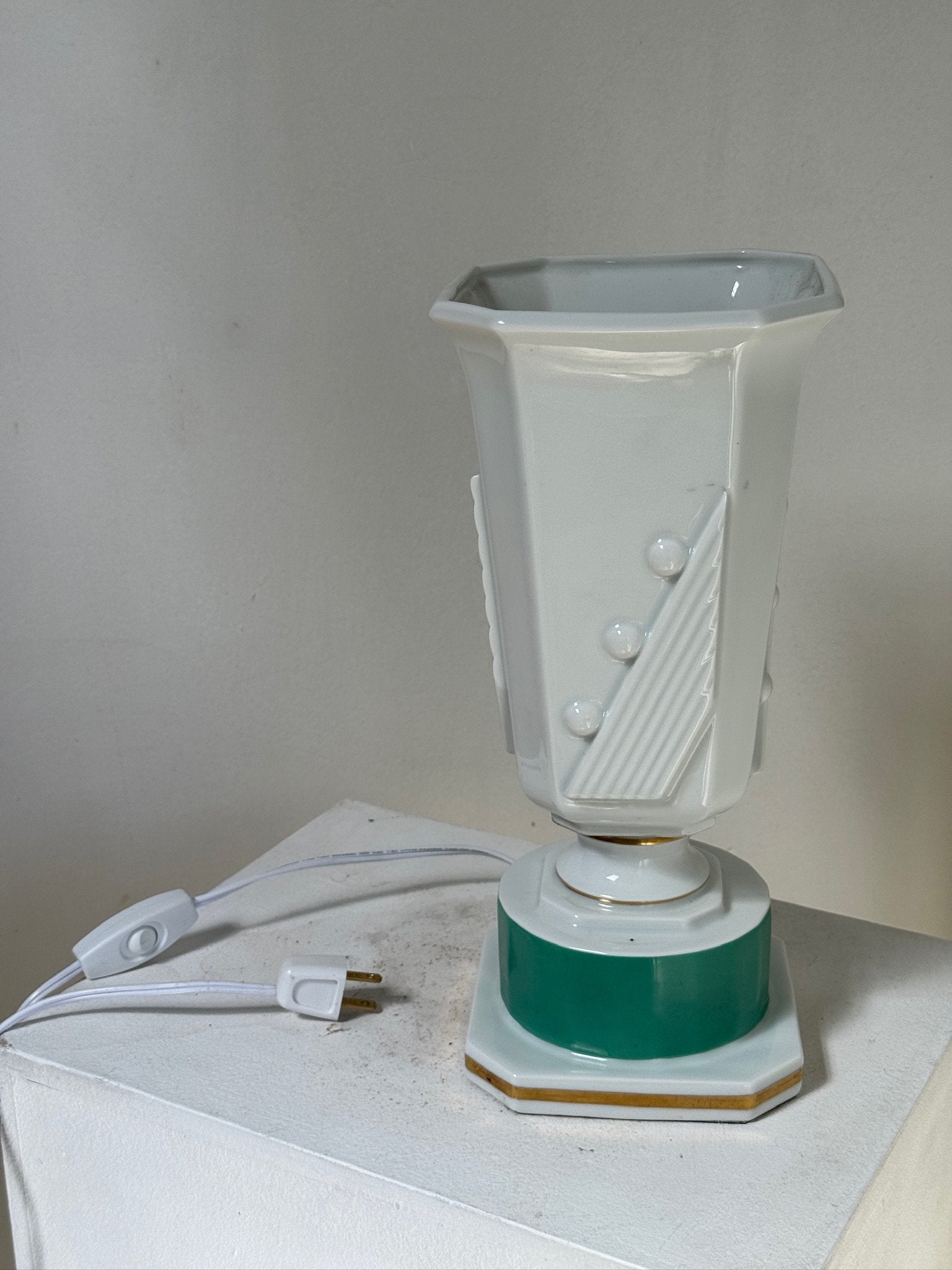 Vintage Art Deco Green and White Ceramic Lamp showcasing timeless design and elegance, perfect for any interior. hommes + gardens estudio