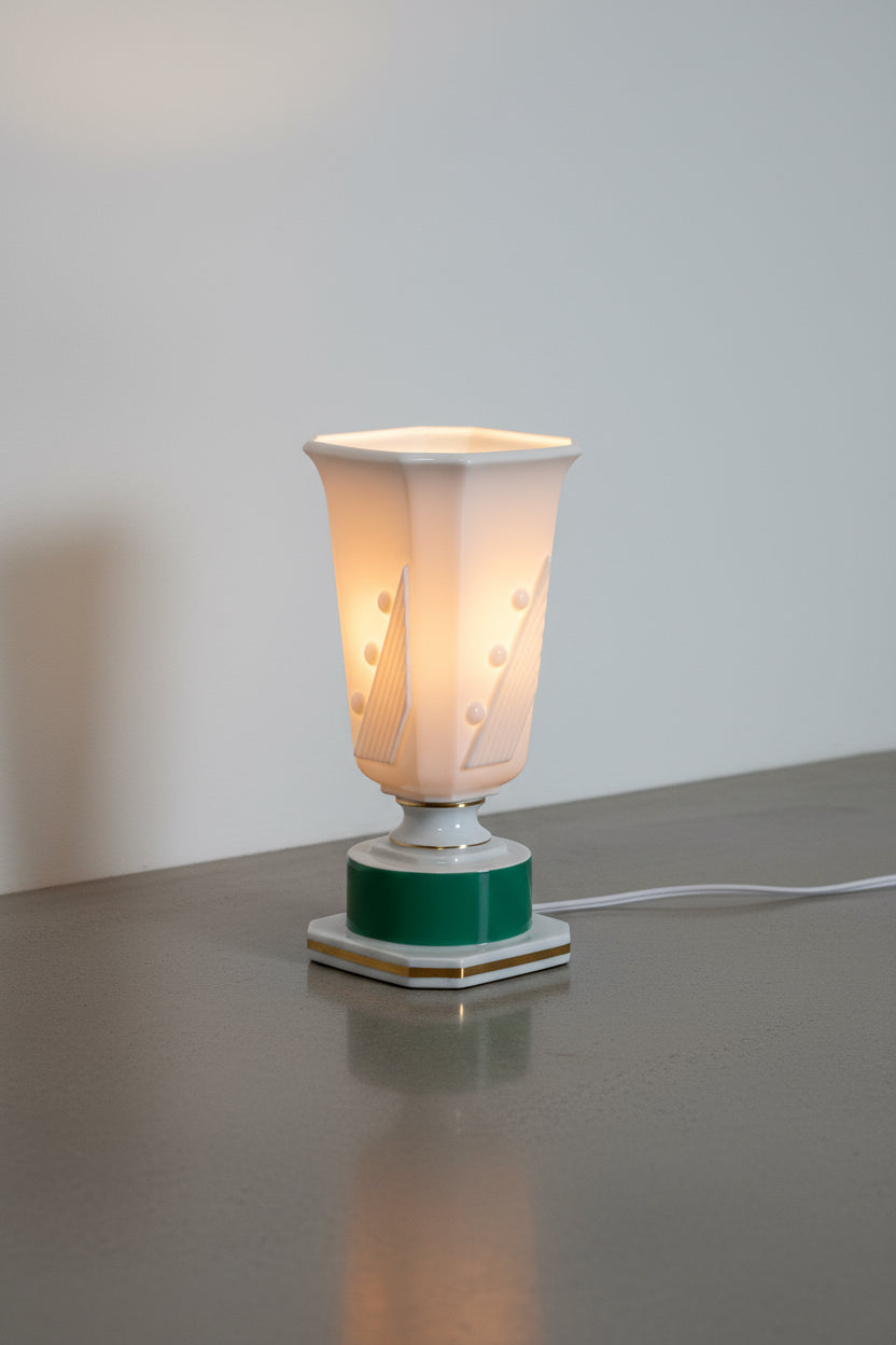 Vintage Art Deco Green and White Ceramic Lamp illuminating a modern space with retro elegance. hommes + gardens estudio.