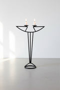 Vintage Art Nouveau Wrought Iron Candle Holder with clean lines and dual candles, perfect for mid-century decor. hommes + gardens estudio.