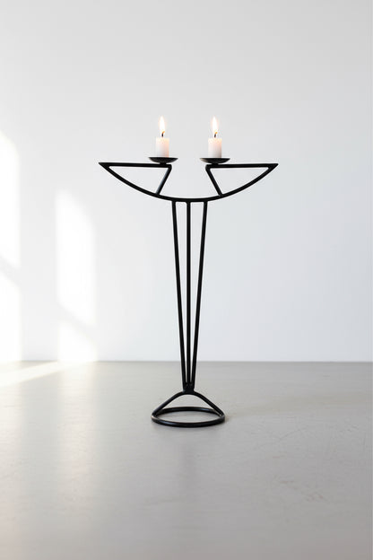 Vintage Art Nouveau wrought iron candle holder from the mid-20th century, featuring elegant curves and modernist Art Deco design — Hommes and Gardens, Candles Collection, Candle Holders, Vintage Metal Art, Wrought Iron Decor, Mid-Century Modern Lighting, Artistic Home Accent, Classic Interior Design.