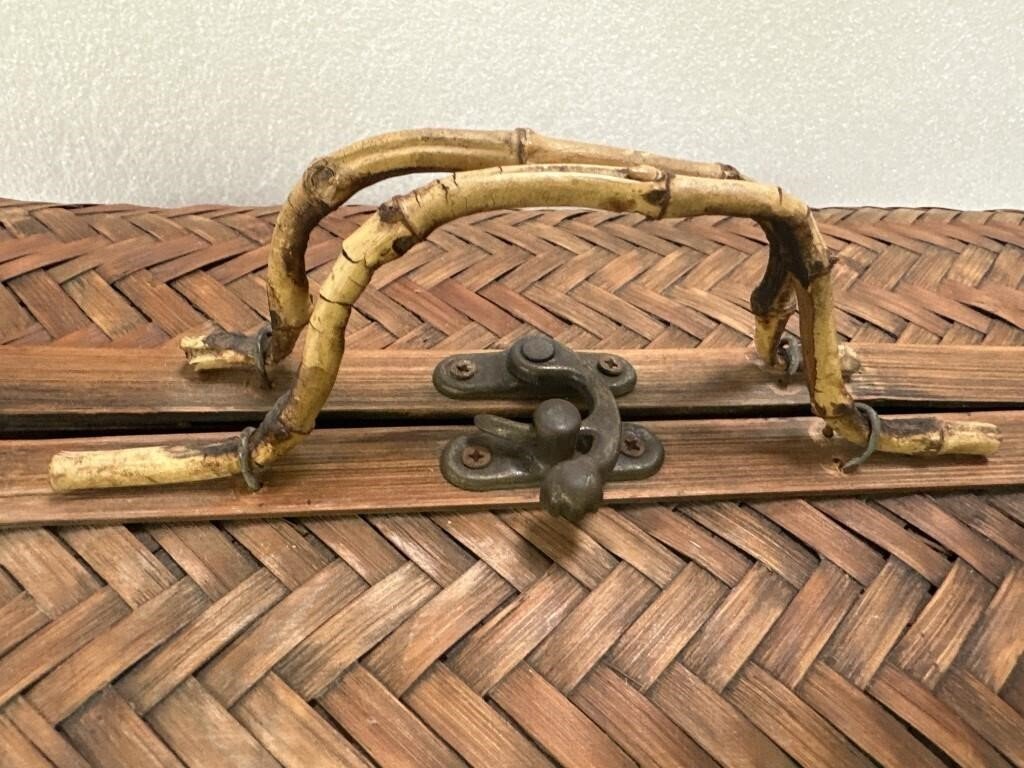 Vintage bamboo travel or picnic case handle detail showcasing rustic charm and sturdy craftsmanship, hommes + gardens estudio.