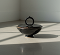 vintage black ceramic lidded bowl for kitchen storage with ring handle lid