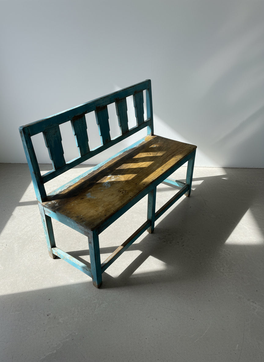 Vintage blue wooden bench with distressed finish, geometric cutout backrest, and solid wood frame, blending rustic charm with timeless farmhouse elegance — Hommes and Gardens, Furniture Collection, Home Decor, Landscape Architect, Interior Designer, Outdoor Living, Outdoor Decorations, Home Design, Luxury Design, Art, Furniture, Objects, Best Gifts, Nature, Backyard, Yard.