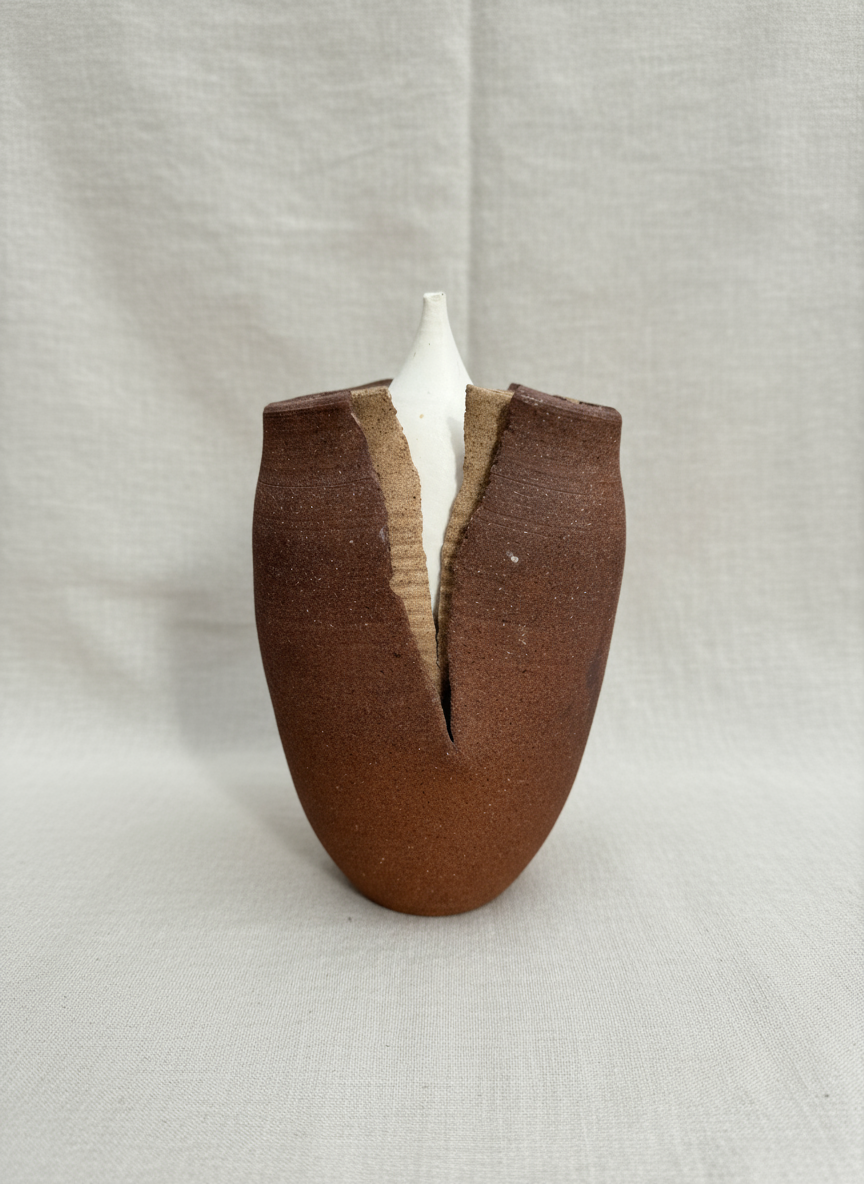 "Transformation" Pottery Art Sculpture featuring earthy tones and unique design, created by Barker in 1985. hommes + gardens estudio.