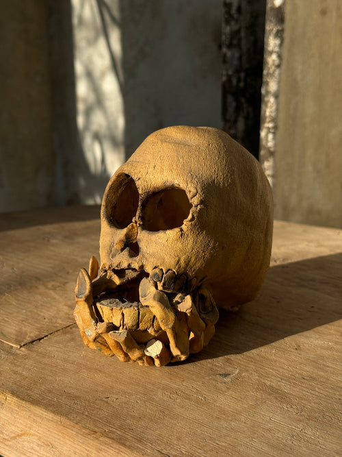 Vintage ceramic skull candle holder with clasped hand design and artistic finish, blending gothic charm and modern artistry — Hommes and Gardens, home decor, outdoor decorations, home design, luxury design, Landscape Architect, Interior Designer, Outdoor Living, Art, Furniture, Objects, Best Gifts, Nature, Backyard, Yard.