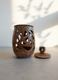Vintage Ceramic Vase with Lid and Geometric Cutout Design showcasing warm earthy glaze and unique silhouette. hommes + gardens estudio.