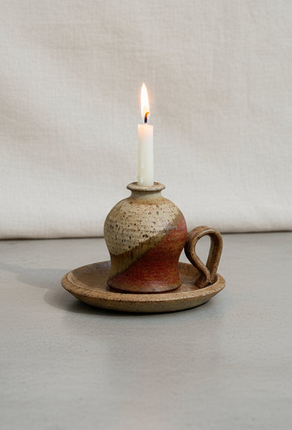 Vintage chamber stick candle holder crafted in glazed brown and beige stoneware, a timeless ceramic piece adding rustic warmth to any space — Hommes and Gardens, Home Decor Collection, Candles, Candle Holders, Vintage Pottery, Ceramic Decor, Rustic Home Accessories, Handmade Lighting Accent.