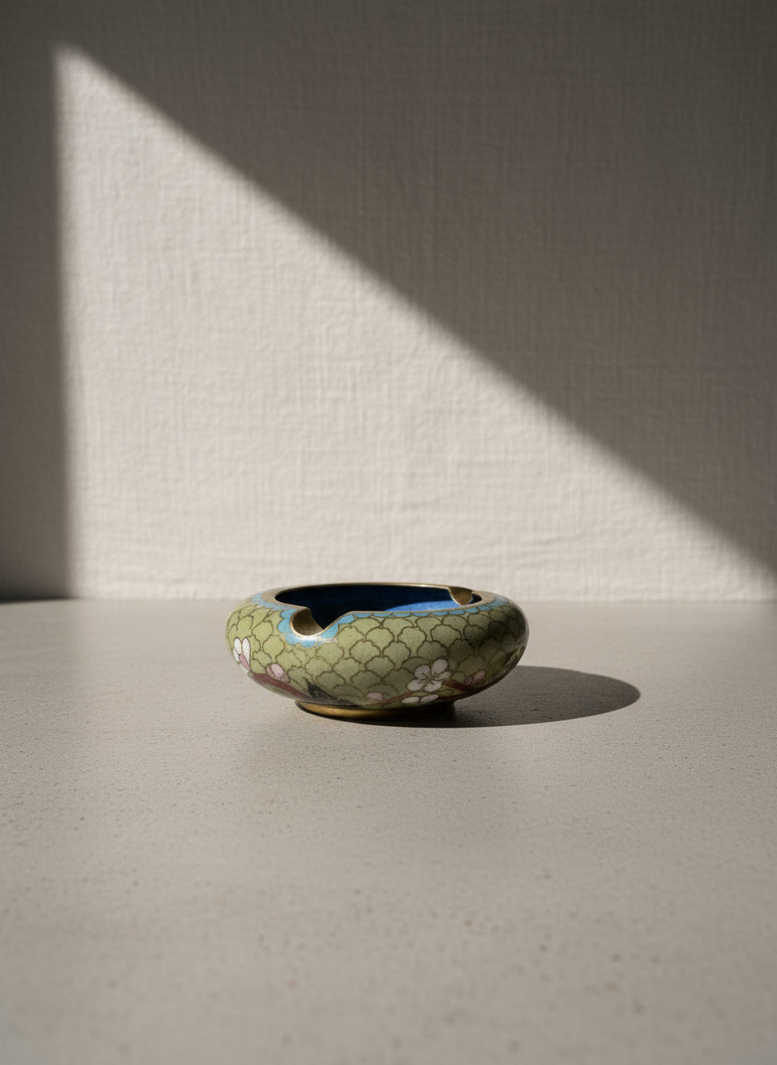 Vintage Chinese Cherry Blossom Ashtray showcasing cherry blossom artwork on green ceramic, adding elegance to any space. hommes + gardens estudio