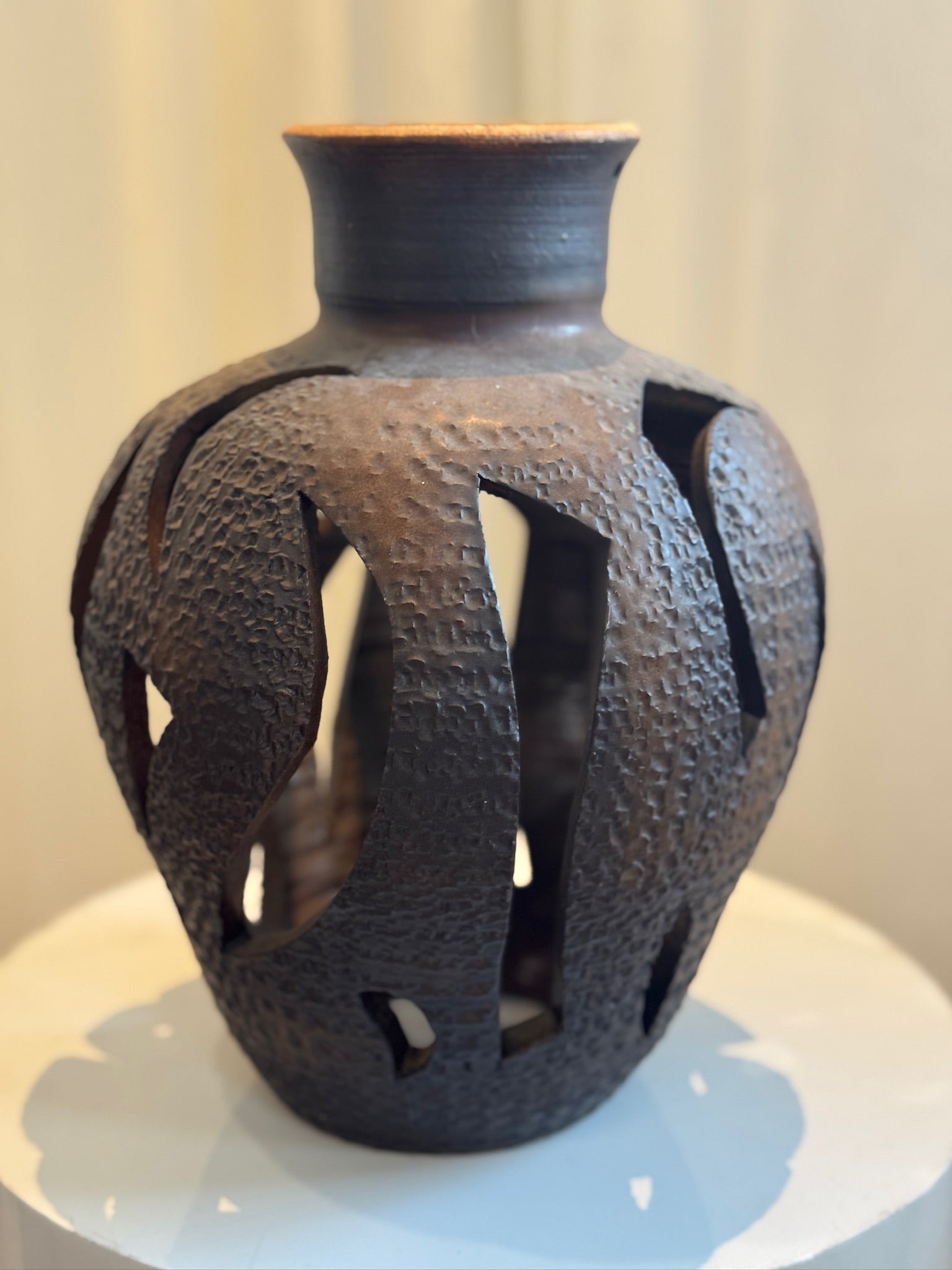 Vintage ceramic vase inspired by David Cressey, showcasing mid-century modern cutout detailing and textured brown finish, architectural art pottery collectible — Hommes and Gardens, Objects + Vases & Vessels Collection, Landscape Architect, Interior Designer, Outdoor Living, Art, Furniture, Objects, Best Gifts, Nature, Backyard, Yard, Outdoor Decorations, Home Decor, Home Design, Luxury Design.