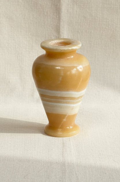 Vintage Egyptian onyx marble alabaster stone vase in honey beige and white tones, reflecting ancient Egyptian artistry and timeless craftsmanship — Hommes and Gardens, Pots + Vessels Collection, Vases, Vintage Stone Art, Alabaster Decor, Onyx Pottery, Cultural Home Accent, Handcrafted Sculpture.