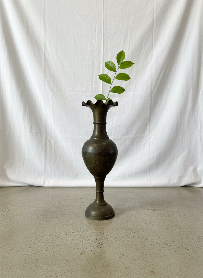 Vintage engraved brass fluted vase with elegant floral etching, tall handcrafted piece adding timeless sophistication to any space — Hommes and Gardens, Home Decor Collection, Landscape Architect, Interior Designer, Outdoor Living, Outdoor Decorations, Home Decor, Home Design, Luxury Design, Art, Furniture, Objects, Best Gifts, Nature, Backyard, Yard.