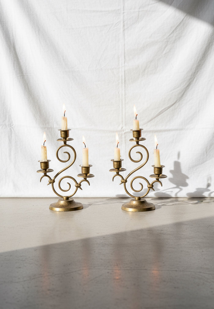 Vintage Etched Brass Candelabra Pair elegantly displayed, enhancing decor with timeless charm. hommes + gardens estudio.