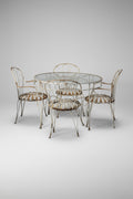 Vintage Francois Carre Garden Chairs & Table showcasing elegant wrought iron design, perfect for any garden setting. hommes + gardens estudio.