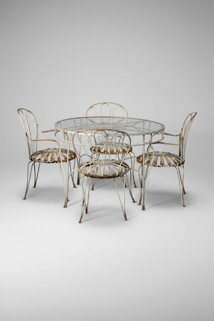 Vintage François Carré garden chairs and table set in classic French wrought iron design, showcasing early 20th-century craftsmanship and timeless outdoor elegance — Hommes and Gardens, Furniture Collection, Outdoor Furniture Sets, Vintage French Design, Wrought Iron Seating, Garden Decor, Patio Furniture, Collectible Outdoor Set.
