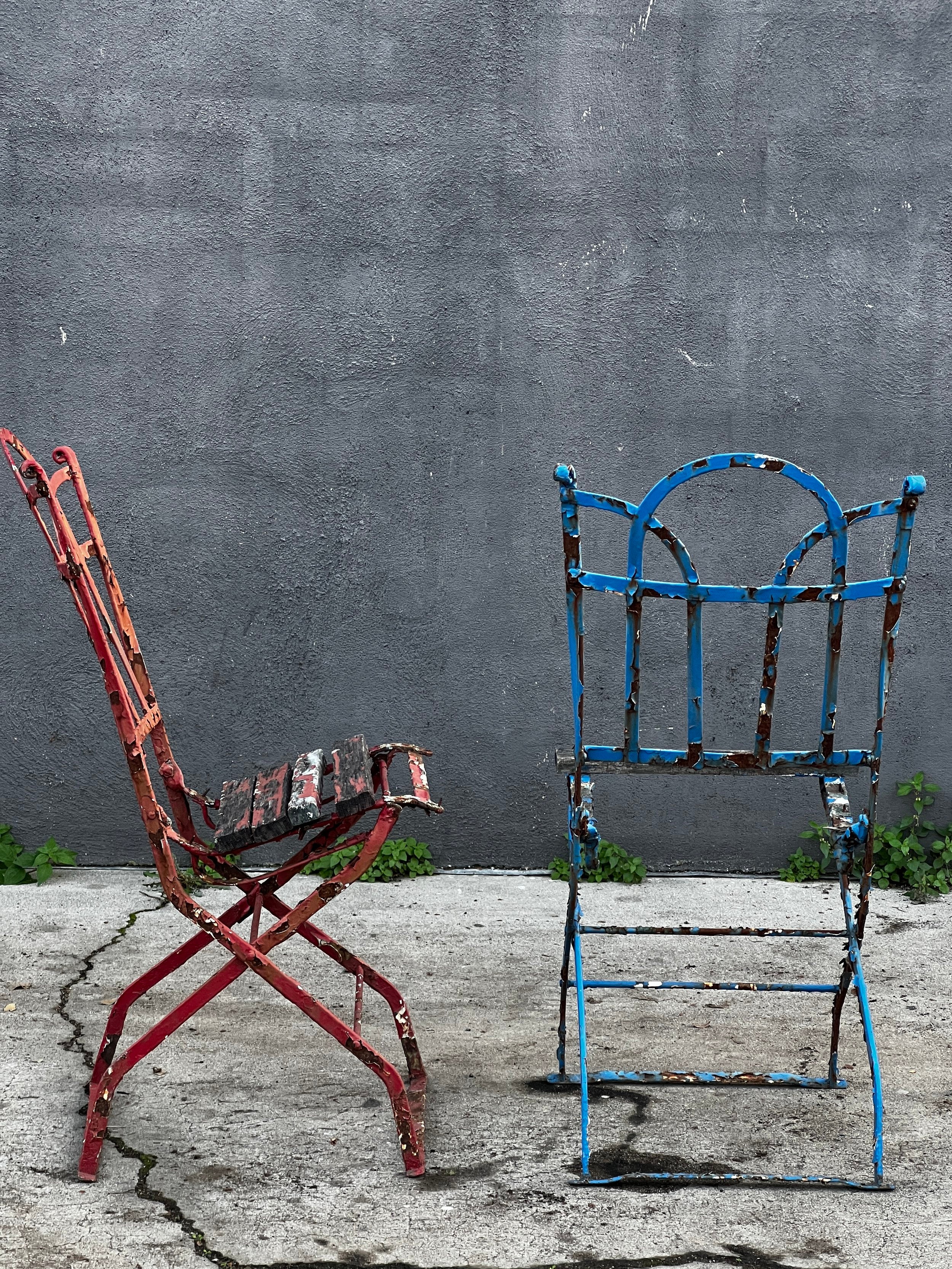 Vintage French folding bistro chairs made from iron and wood with aged patina, ideal for garden cafés and outdoor elegance — Hommes and Gardens, Furniture Collection, home decor, outdoor decorations, home design, luxury design, Landscape Architect, Interior Designer, Outdoor Living, Art, Furniture, Objects, Best Gifts, Nature, Backyard, Yard.