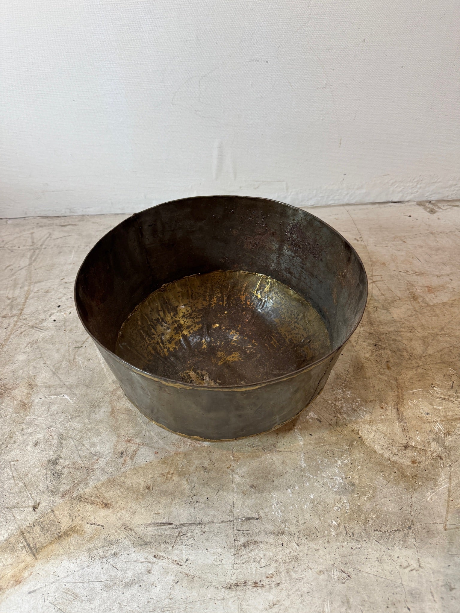 Vintage hand-forged metal bowl with brass base and dark iron body, a timeless decorative accent with aged texture — Hommes and Gardens, Catchall Collection, Landscape Architect, Interior Designer, Outdoor Living, Outdoor Decorations, Home Decor, Home Design, Luxury Design, Art, Furniture, Objects, Best Gifts, Nature, Backyard, Yard.