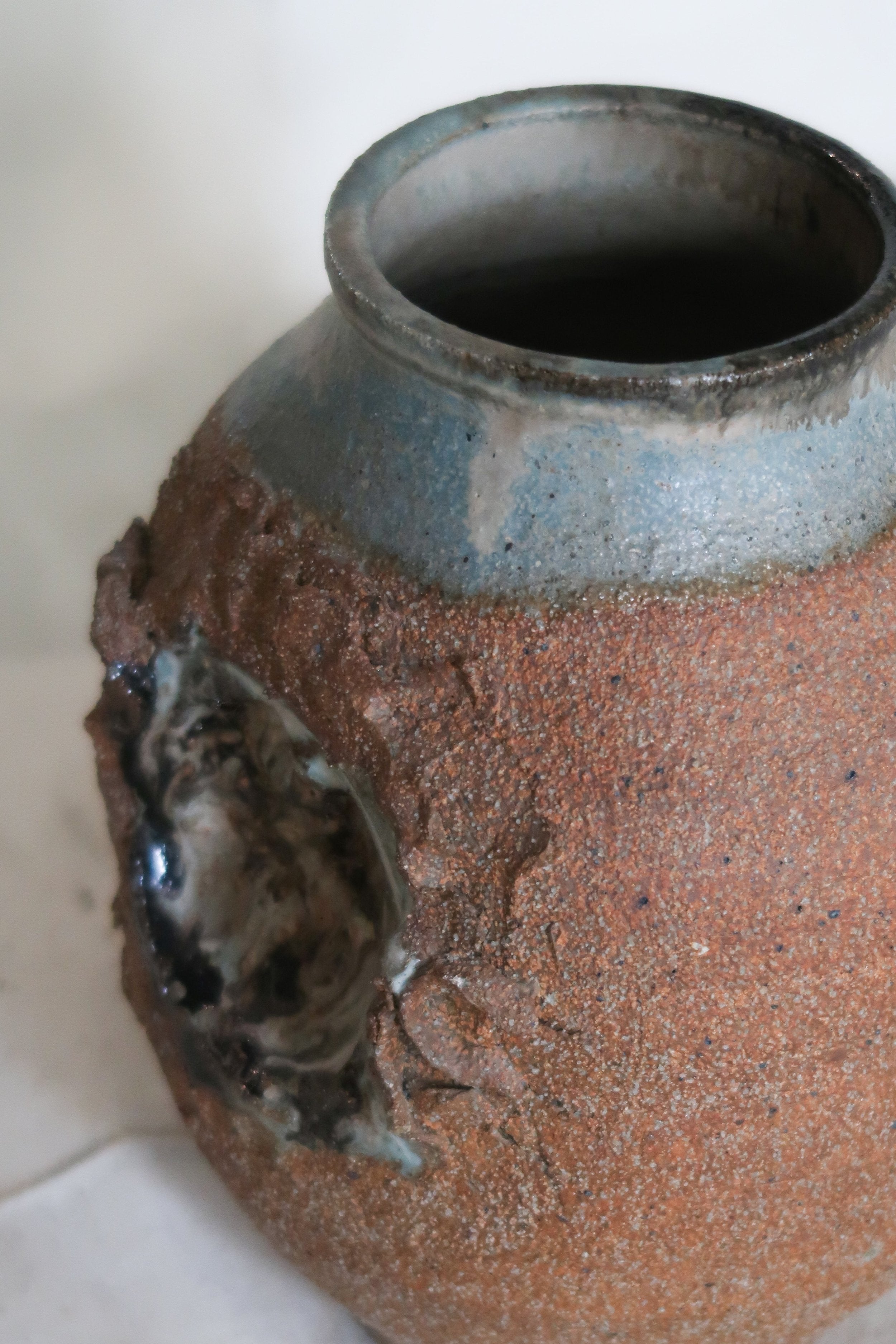 Close-up of a Signed Mid-Century Brutalist Stoneware Vase showcasing unique texture and artistry, hommes + gardens estudio.