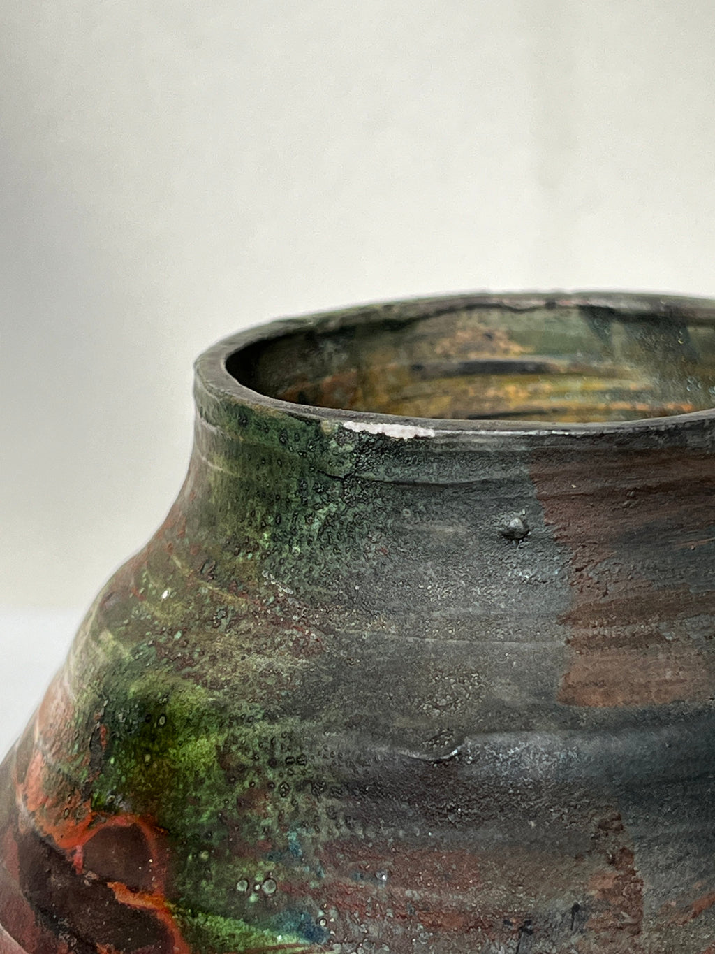 Raku Vintage Hand Crafted Ceramic Vase Signed Billie Goldman showcasing a unique multicolor glaze pattern. hommes + gardens estudio