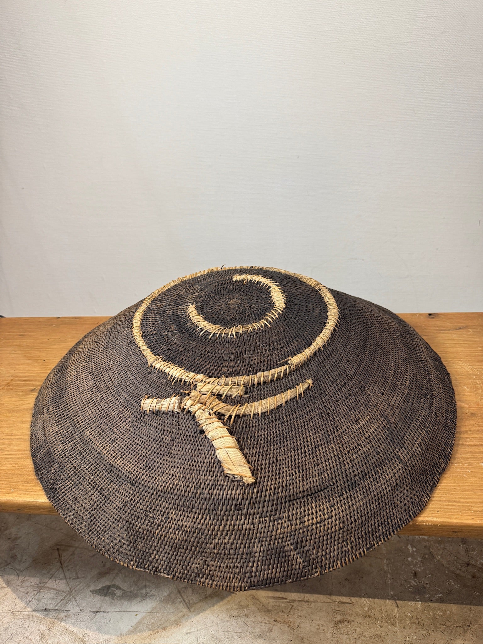 Rare Vintage Handwoven Basket with Organic Spiral & Tribal Motif, showcasing artisanal craftsmanship and earthy tones. hommes + gardens estudio.