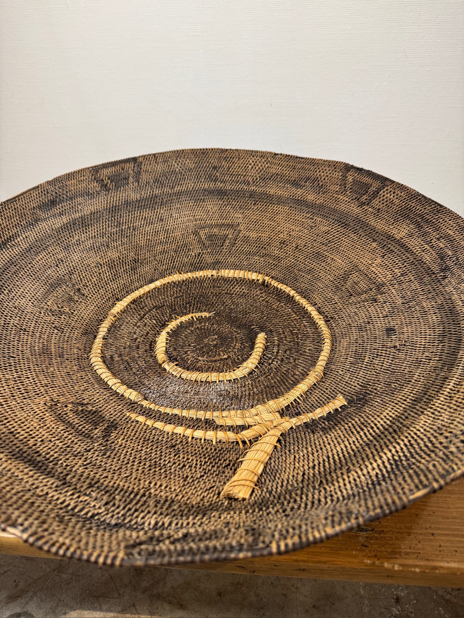 Rare Vintage Handwoven Basket with Organic Spiral & Tribal Motif on display, showcasing intricate weaving, hommes + gardens estudio.