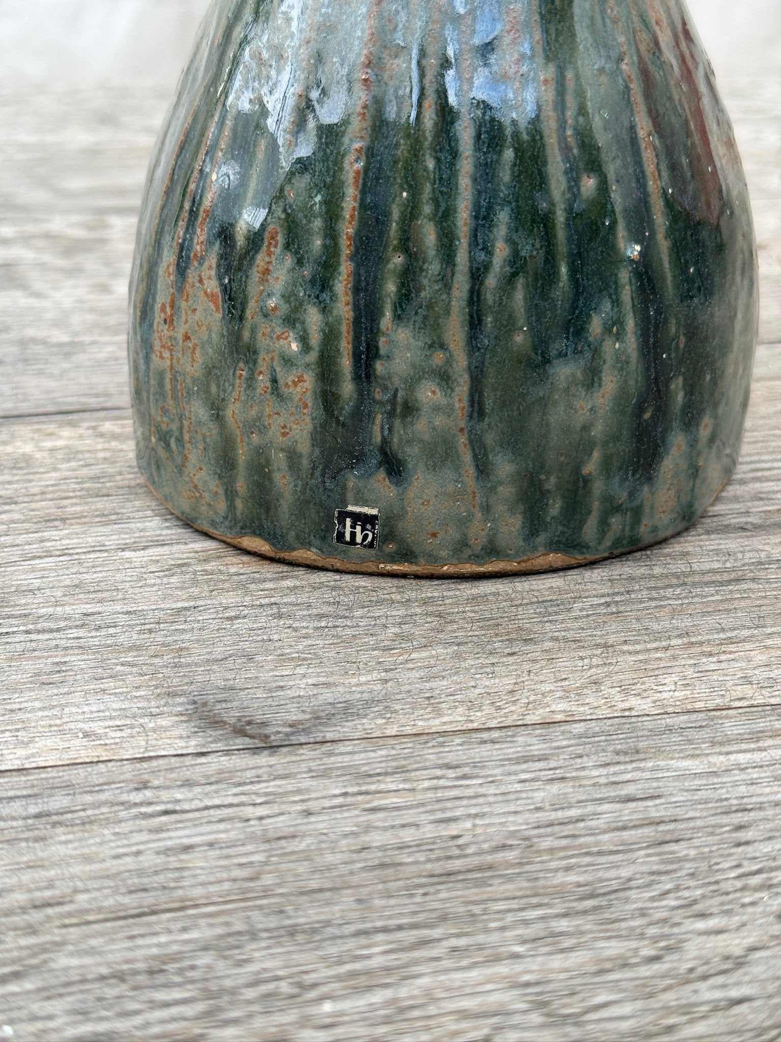 Close-up of base marking on Vintage Stoneware Hungarian Mermaid Figurine Candle Holder, showcasing its unique finish. hommes + gardens estudio.