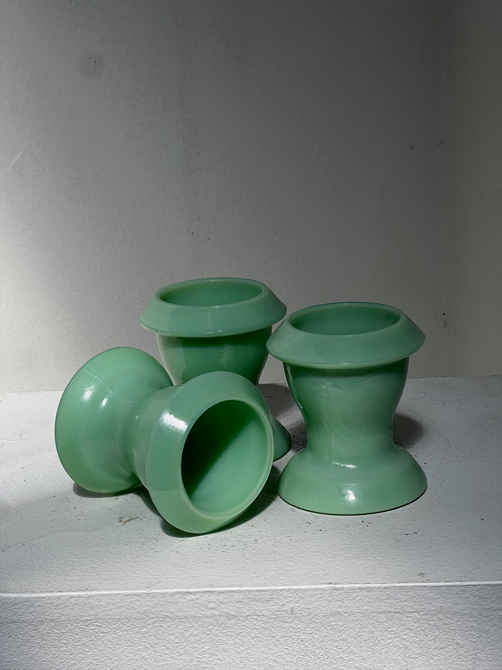 Vintage Teal Jadeite Egg Cup (Set of 3) displayed on a neutral surface, showcasing retro charm and elegance. hommes + gardens estudio.