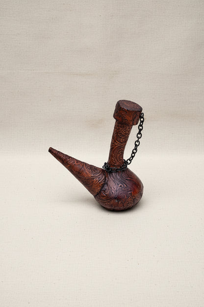 Vintage leather-covered wine decanter featuring genuine leather wrap and elegant craftsmanship, perfect for bar or dining decor — Hommes and Gardens, Home Decor Collection, Decanters, Vintage Barware, Leather Accessories, Wine Serving, Luxury Home Decor, Gift for Wine Lovers.