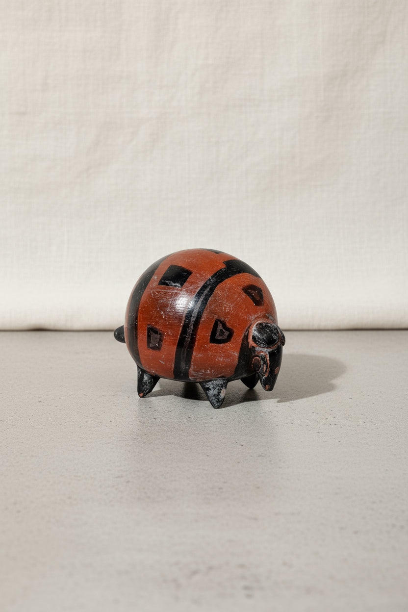 Vintage Lenca Pottery Small Armadillo Figurine showcasing unique craftsmanship by Lenca artisans, hommes + gardens estudio.