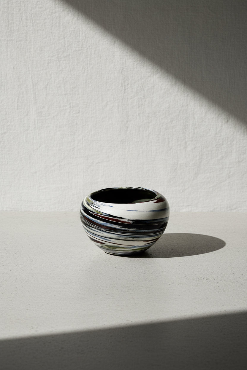 Vintage Multicolor Desert Sands Pottery Bowl showcasing abstract marbled patterns, a unique home decor piece, hommes + gardens estudio.