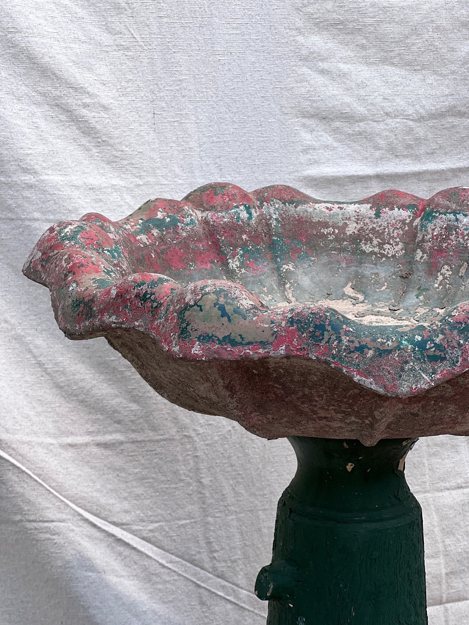 Vintage painted concrete bird bath with pottery base featuring aged green and red patina, ideal for outdoor gardens — Hommes and Gardens, Water Features Collection, home decor, garden decor, outdoor decorations, home design, luxury design, Landscape Architect, Interior Designer, Outdoor Living, Art, Furniture, Objects, Best Gifts, Nature, Backyard, Yard.