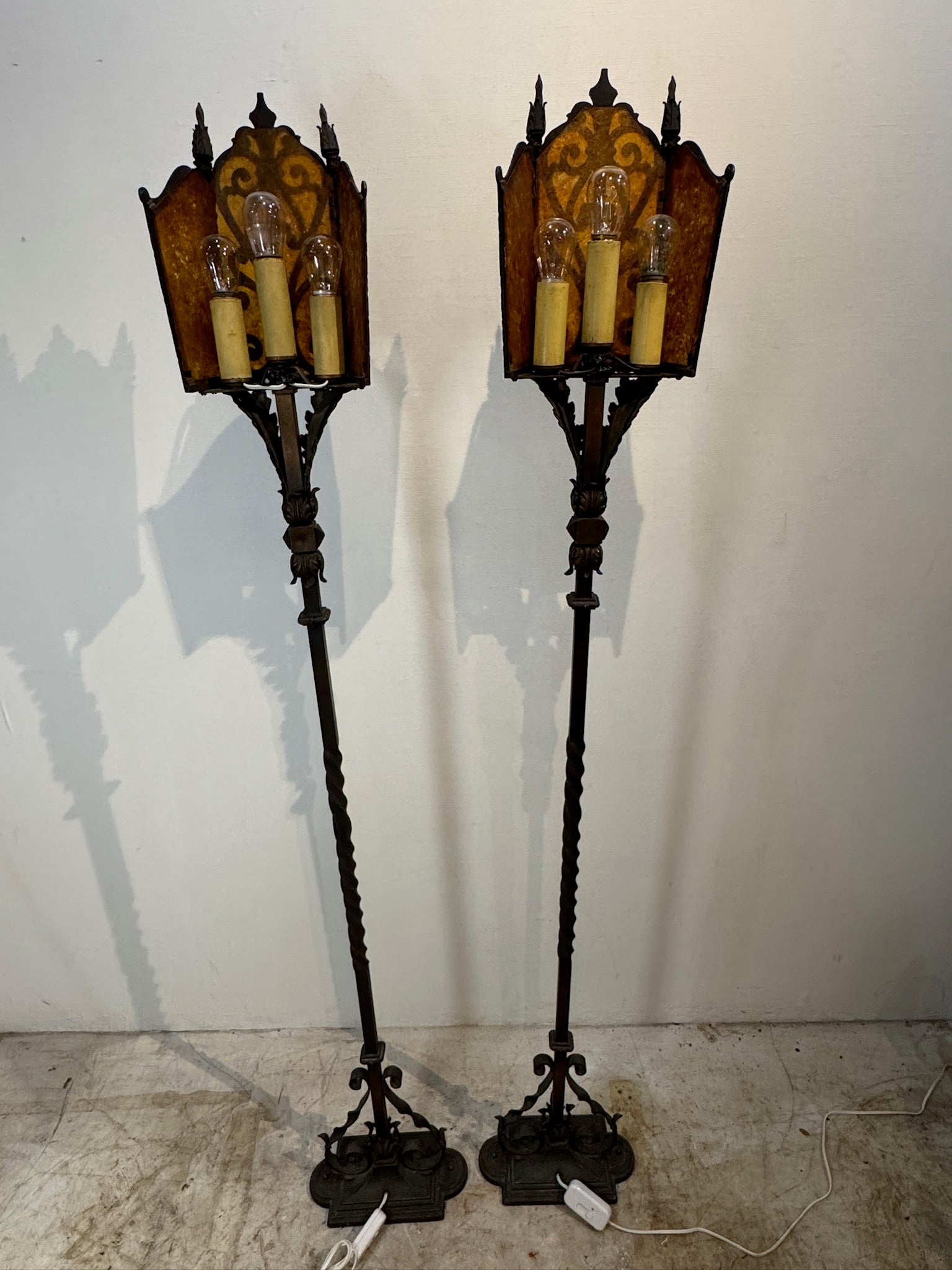 Vintage pair of wrought iron floor lamps in rustic lantern style with amber mica accents, ideal for cozy vintage interiors — Hommes and Gardens, Lights + Lanterns Collection, Landscape Architect, Interior Designer, Outdoor Living, Art, Furniture, Objects, Best Gifts, Nature, Backyard, Yard, Outdoor Decorations, Home Decor, Home Design, Luxury Design.